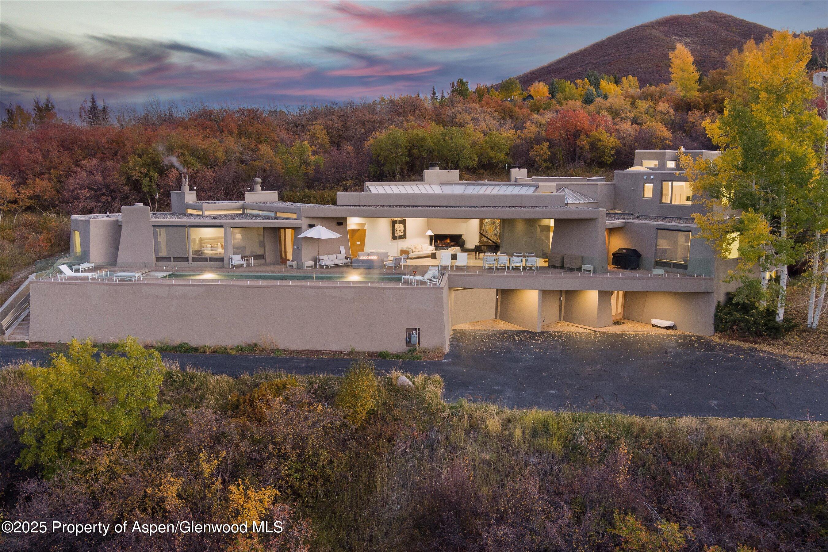 699 Eppley Drive Aspen, CO 81612 - Photo 45 of 45 a large body of water with a building in the background