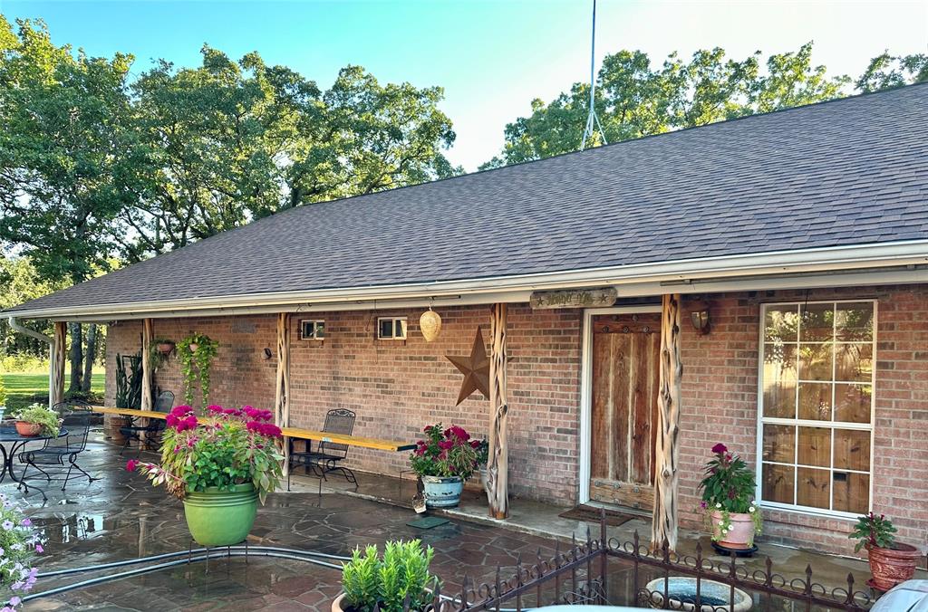 1149 Country Club Road Bowie, TX 76230 - Photo 16 of 17 a view of a garage