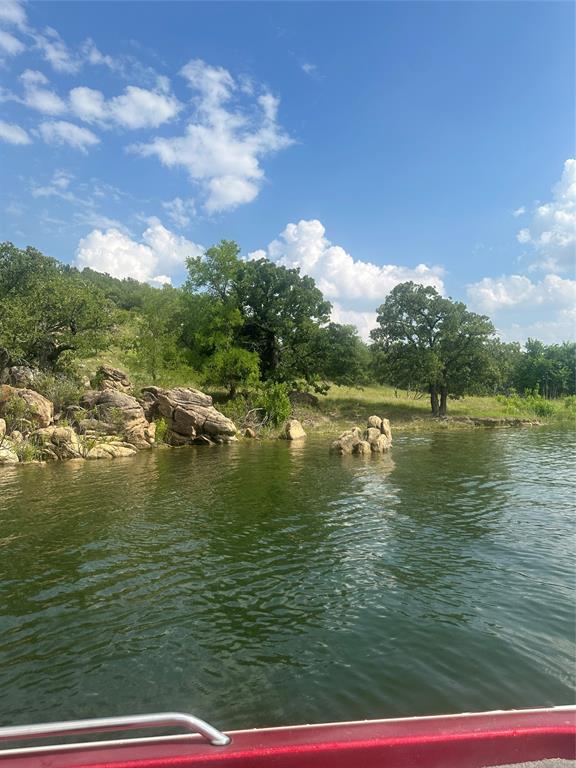 1149 Country Club Road Bowie, TX 76230 - Photo 8 of 17 a view of lake view and mountain view