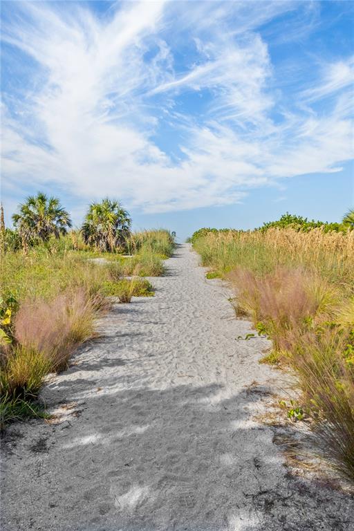 8630 Midnight Pass Road, Unit 103A Sarasota, FL 34242 - Photo 25 of 44 a view of beach and ocean