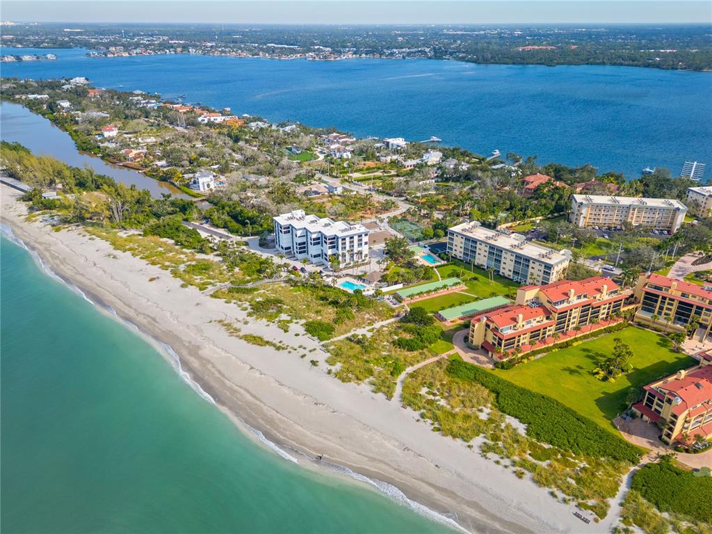 8630 Midnight Pass Road, Unit 103A Sarasota, FL 34242 - Photo 35 of 44 a view of a city and an ocean view