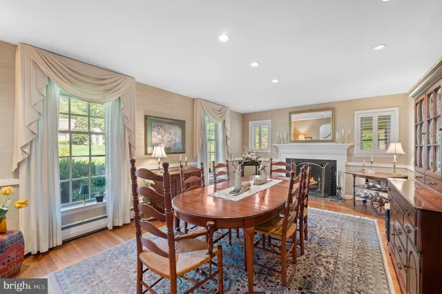 a view of a dining room with furniture and a livingroom