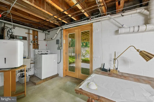 a bed room with a bed and a window