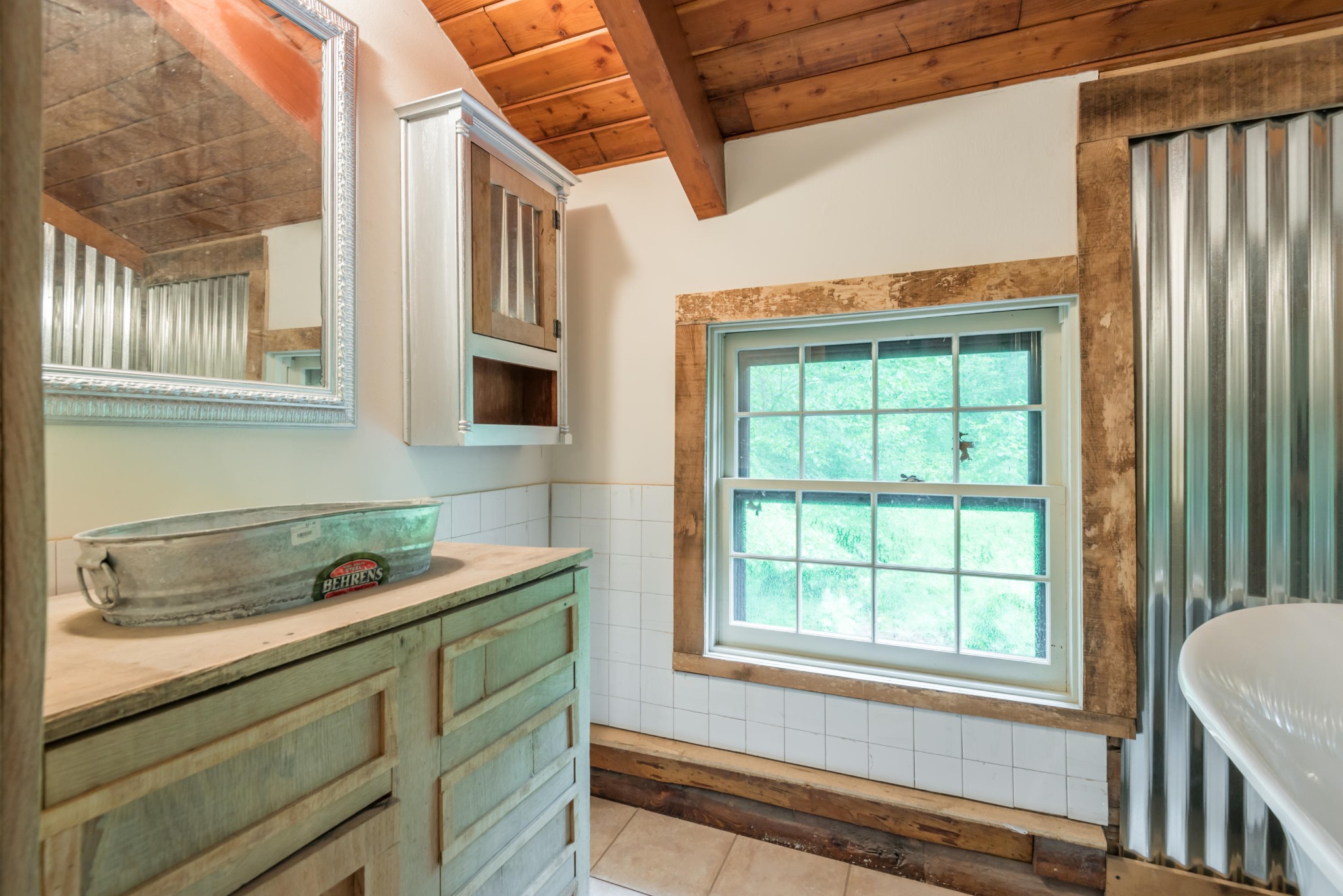 145 Scruggs Cemetery Road Clinton, TN 37716 - Photo 21 of 26 a bathroom with a sink and a window