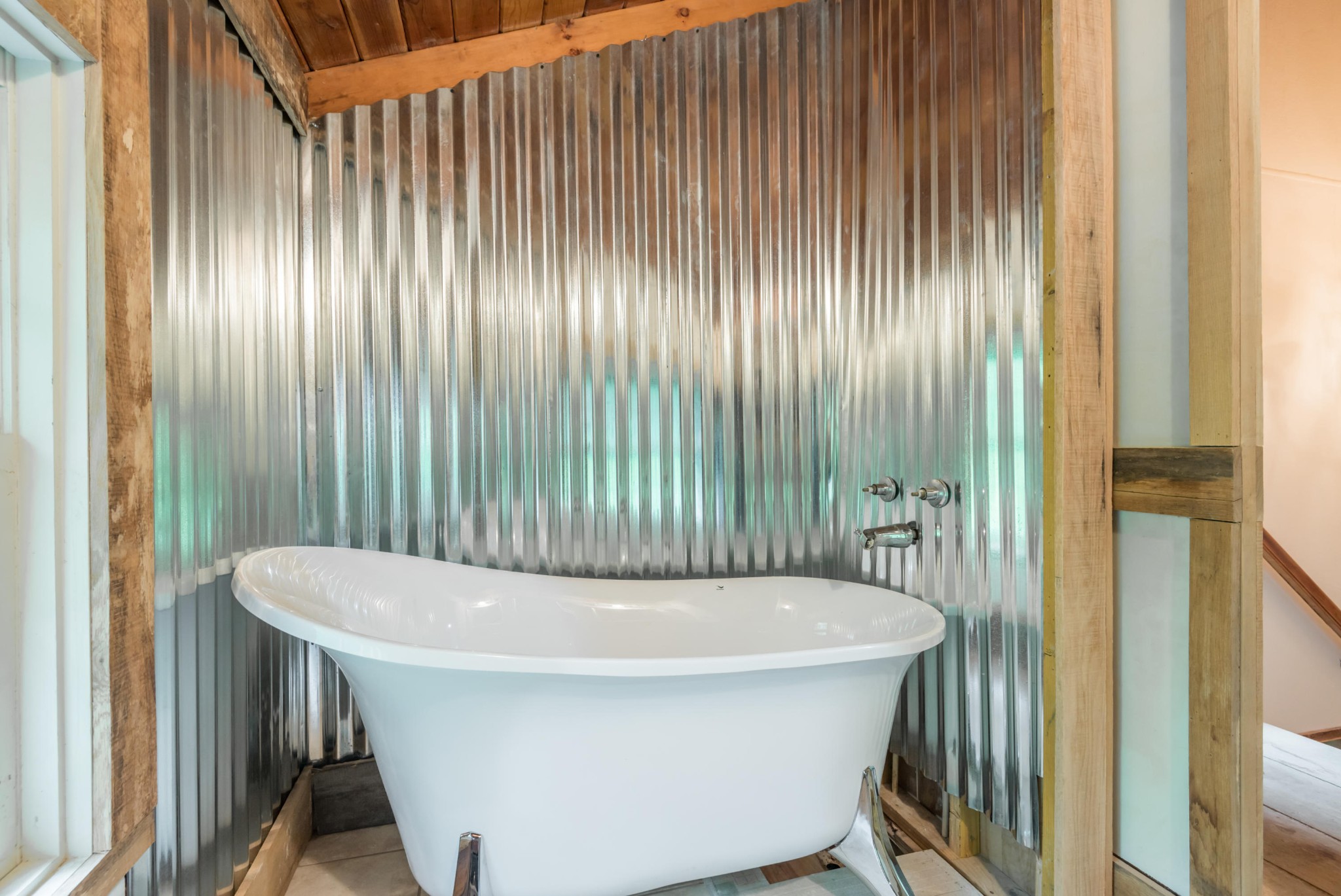145 Scruggs Cemetery Road Clinton, TN 37716 - Photo 22 of 26 a bathroom with a bathtub