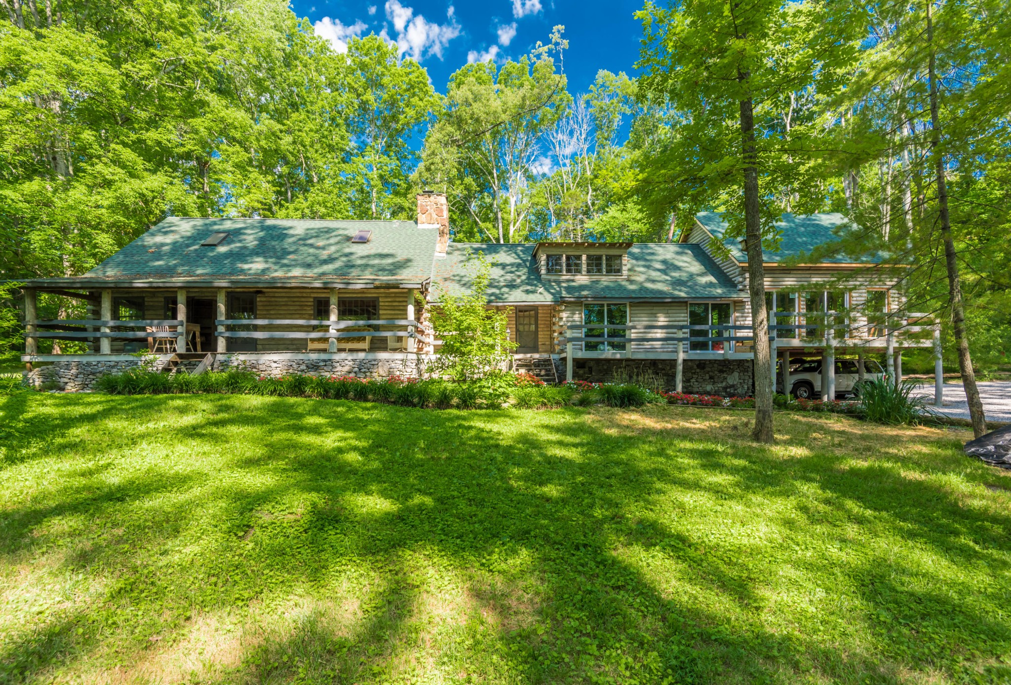 145 Scruggs Cemetery Road Clinton, TN 37716 - Photo 26 of 26 a view of a house with a backyard