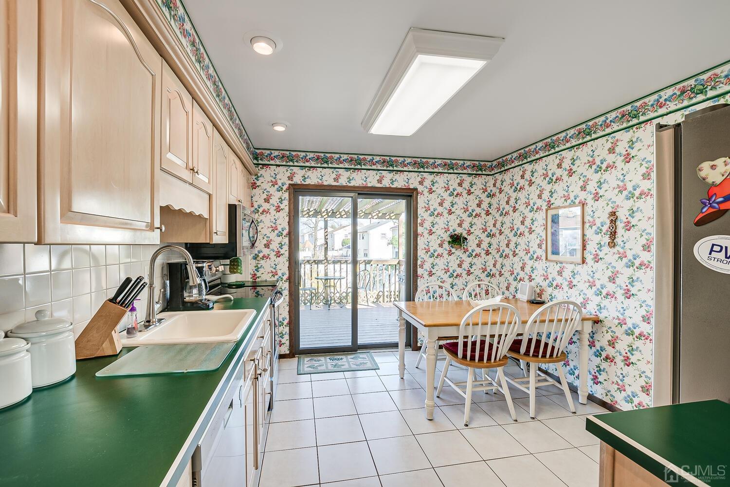 30 Baltic Street Edison, NJ 08820 - Photo 17 of 42 a dining room with furniture and a large window