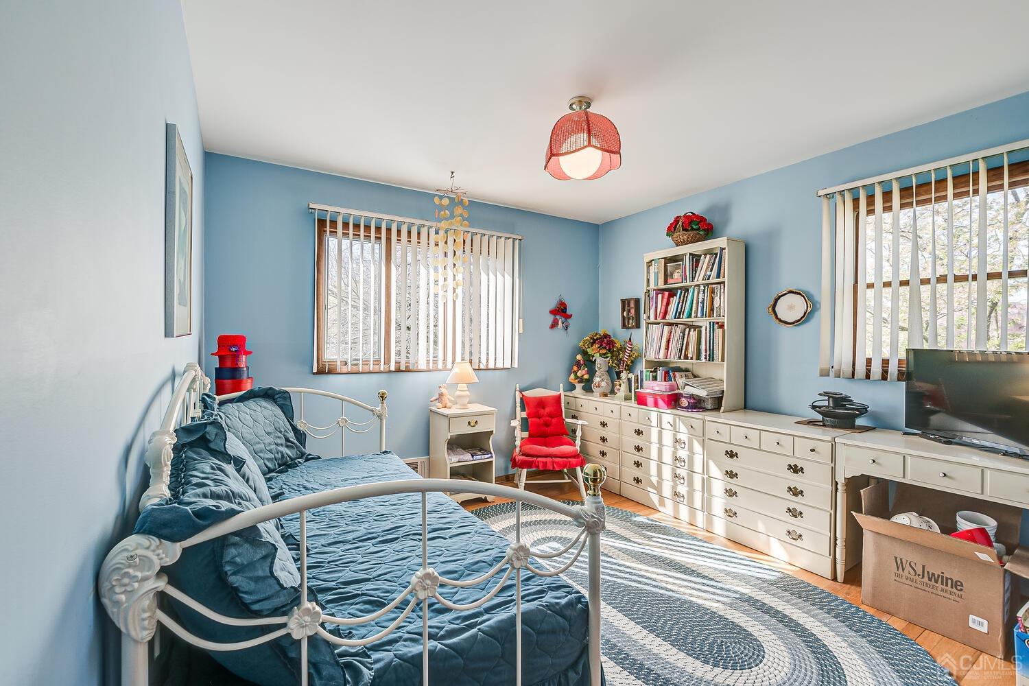 30 Baltic Street Edison, NJ 08820 - Photo 26 of 42 a living room with furniture and a flat screen tv