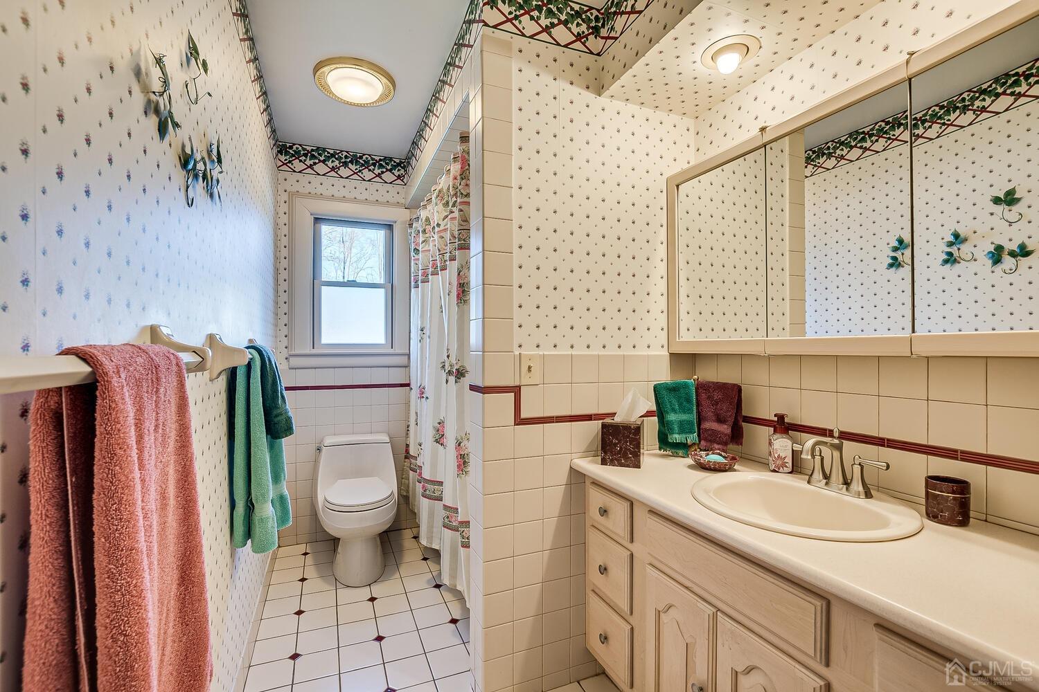 30 Baltic Street Edison, NJ 08820 - Photo 29 of 42 a bathroom with a sink toilet and shower