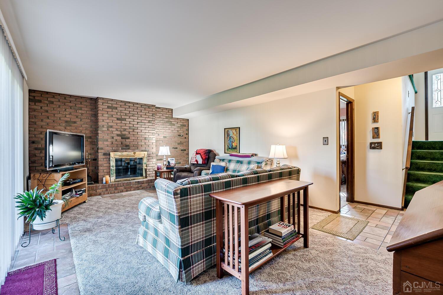30 Baltic Street Edison, NJ 08820 - Photo 30 of 42 a view of a living room and dining room