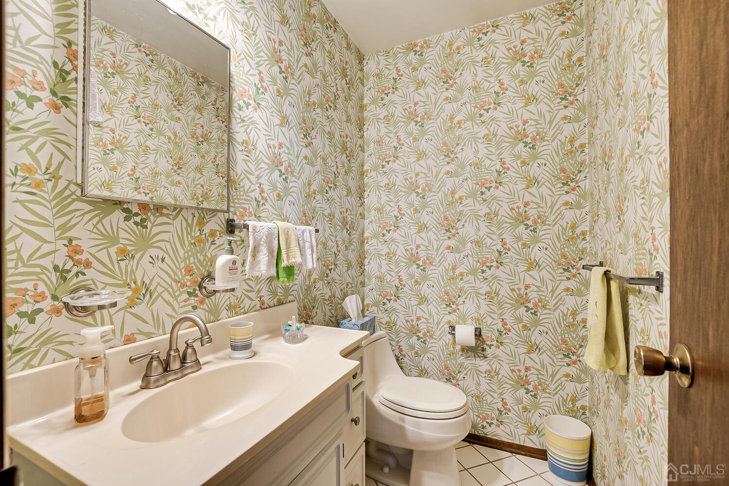 30 Baltic Street Edison, NJ 08820 - Photo 36 of 42 a bathroom with a sink and a toilet