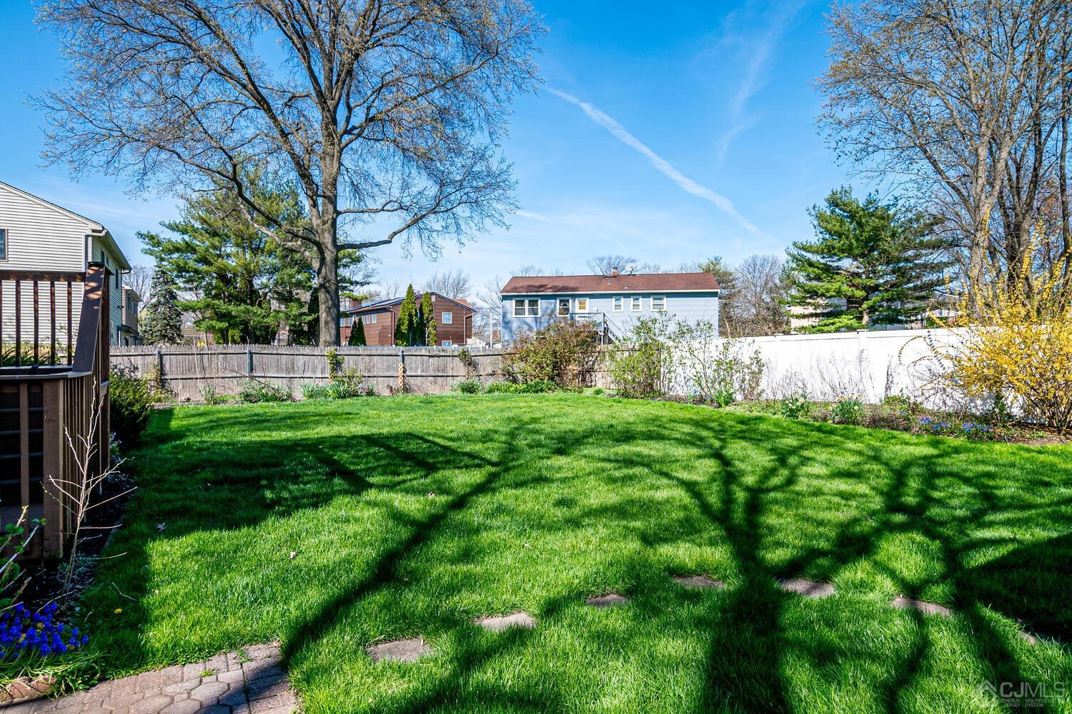 30 Baltic Street Edison, NJ 08820 - Photo 39 of 42 a view of a house with a yard and sitting area