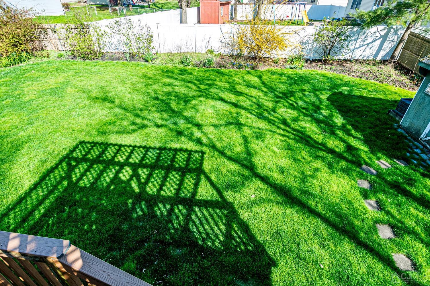 30 Baltic Street Edison, NJ 08820 - Photo 41 of 42 a view of a yard with plants