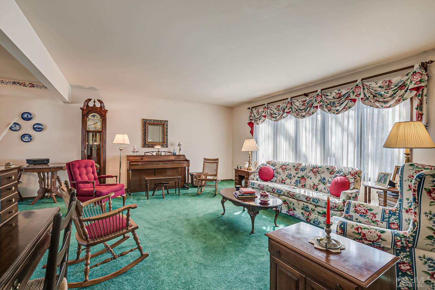 30 Baltic Street Edison, NJ 08820 - Photo 9 of 42 a living room with furniture and a flat screen tv
