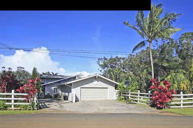 180 Kapuai Road Haiku, HI 96708 - Photo 1 of 29 a front view of a house with a yard