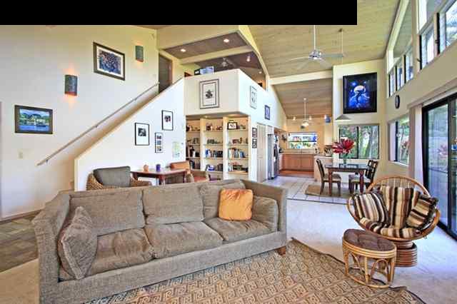 180 Kapuai Road Haiku, HI 96708 - Photo 5 of 29 a living room with furniture and wooden floor