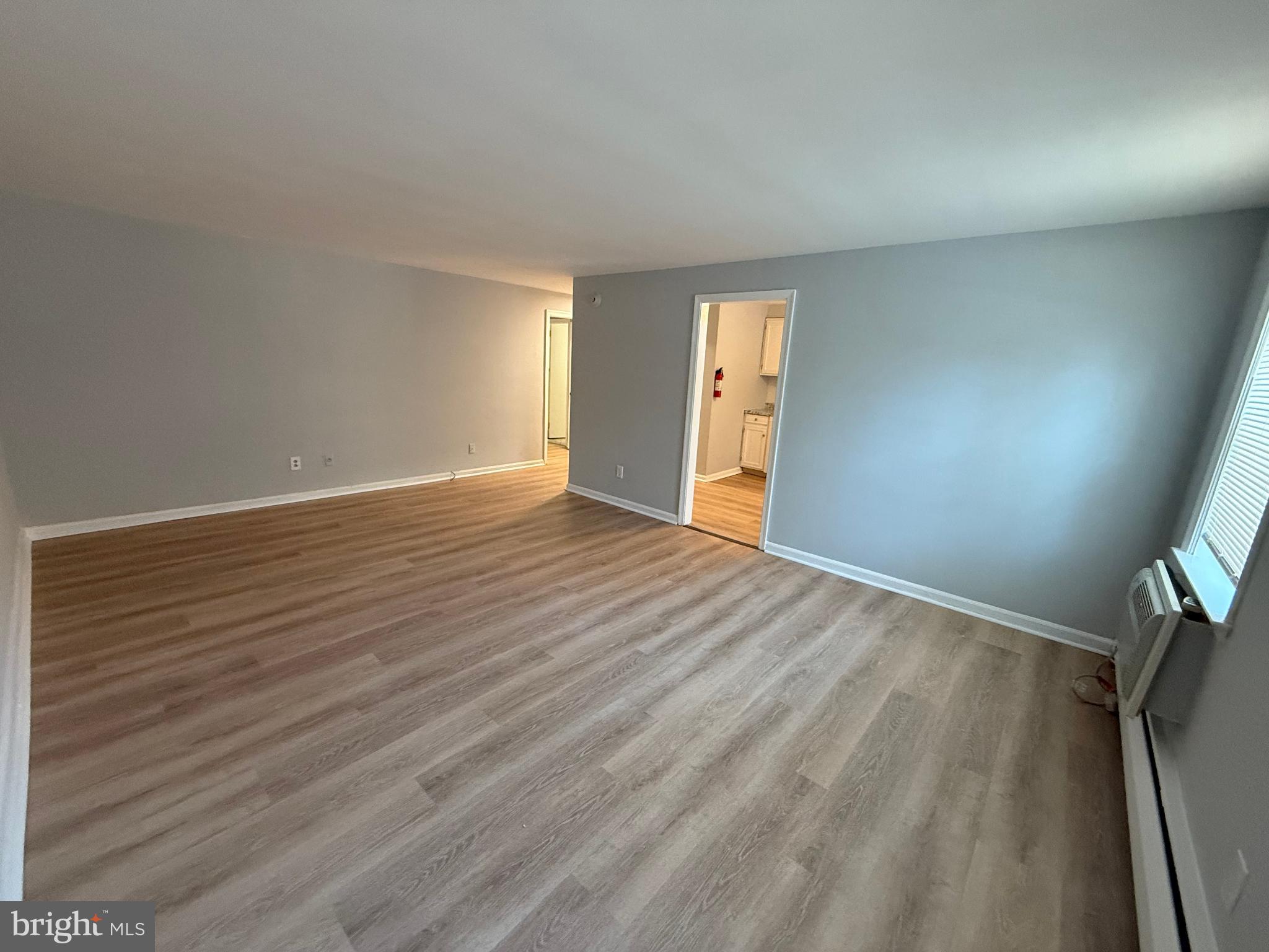 27 Wallingford Avenue, Unit B3 Wallingford, PA 19086 - Photo 6 of 12 Spacious, light-filled living area awaits you.