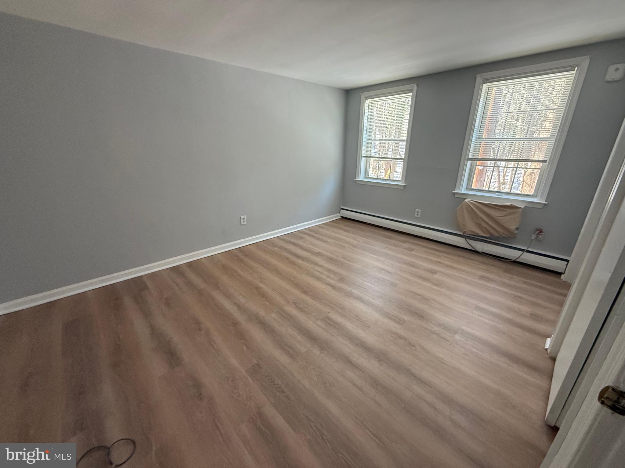 27 Wallingford Avenue, Unit B3 Wallingford, PA 19086 - Photo 7 of 12 Bright and airy Bedroom 1 w double closets
