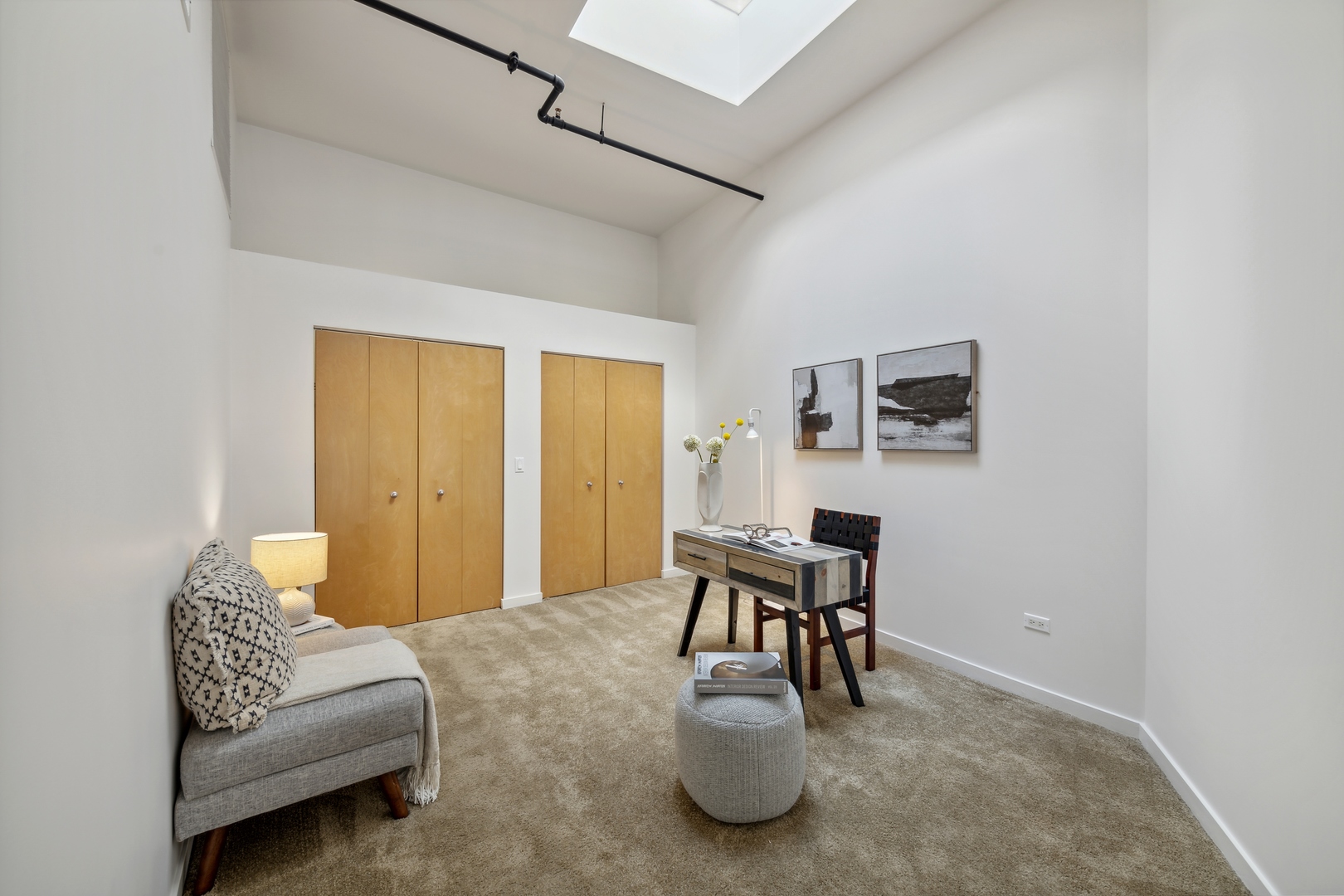 1224 West Van Buren Street, Unit 810 Chicago, IL 60607 - Photo 23 of 28 a living room with furniture and a table