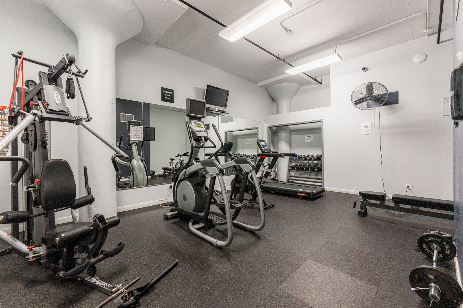 1224 West Van Buren Street, Unit 810 Chicago, IL 60607 - Photo 28 of 28 a view of a room with gym equipment