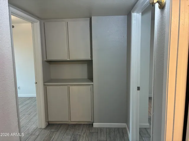 a view of walk in closet with window