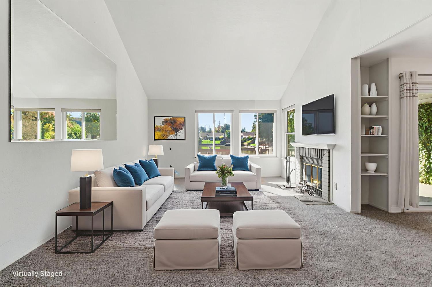 7348 Lighthouse Drive Stockton, CA 95219 - Photo 11 of 56 a living room with fireplace furniture and a flat screen tv