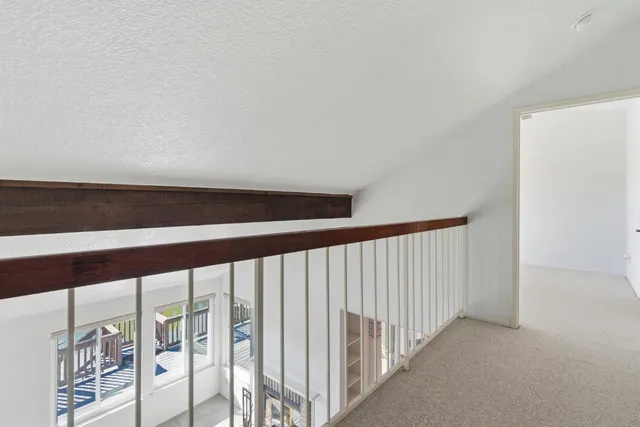 a bathroom with a shower and toilet