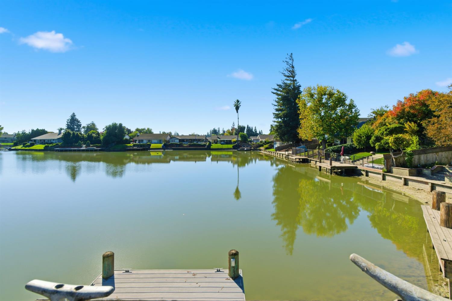 7348 Lighthouse Drive Stockton, CA 95219 - Photo 40 of 56 a view of a lake with houses