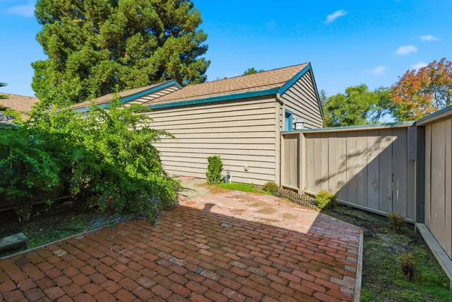 an aerial view of a city with lake view