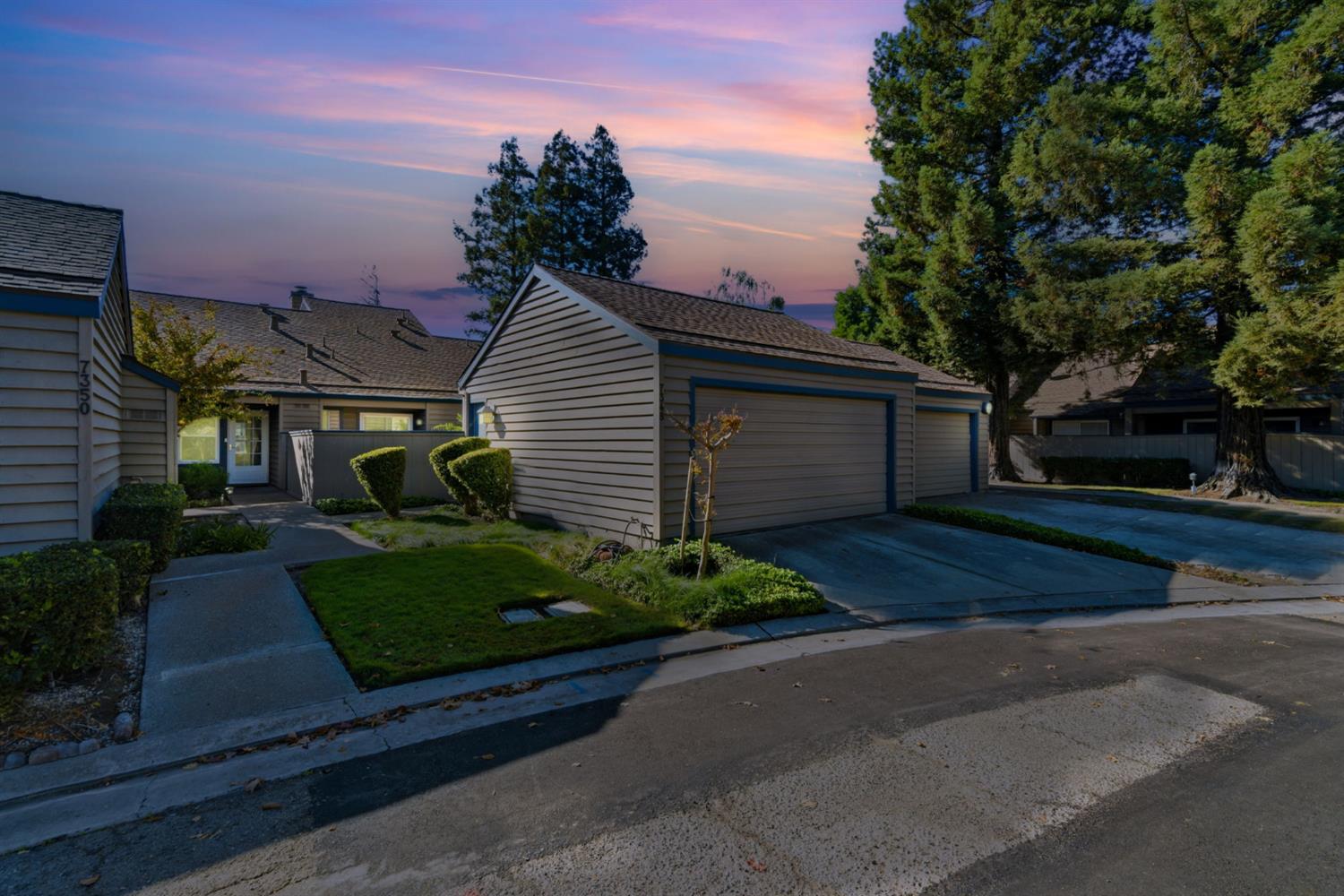 7348 Lighthouse Drive Stockton, CA 95219 - Photo 56 of 56 a front view of a house with a yard and a garage