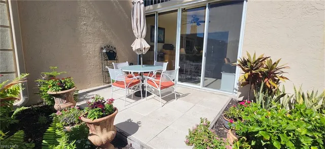 an outdoor space with furniture