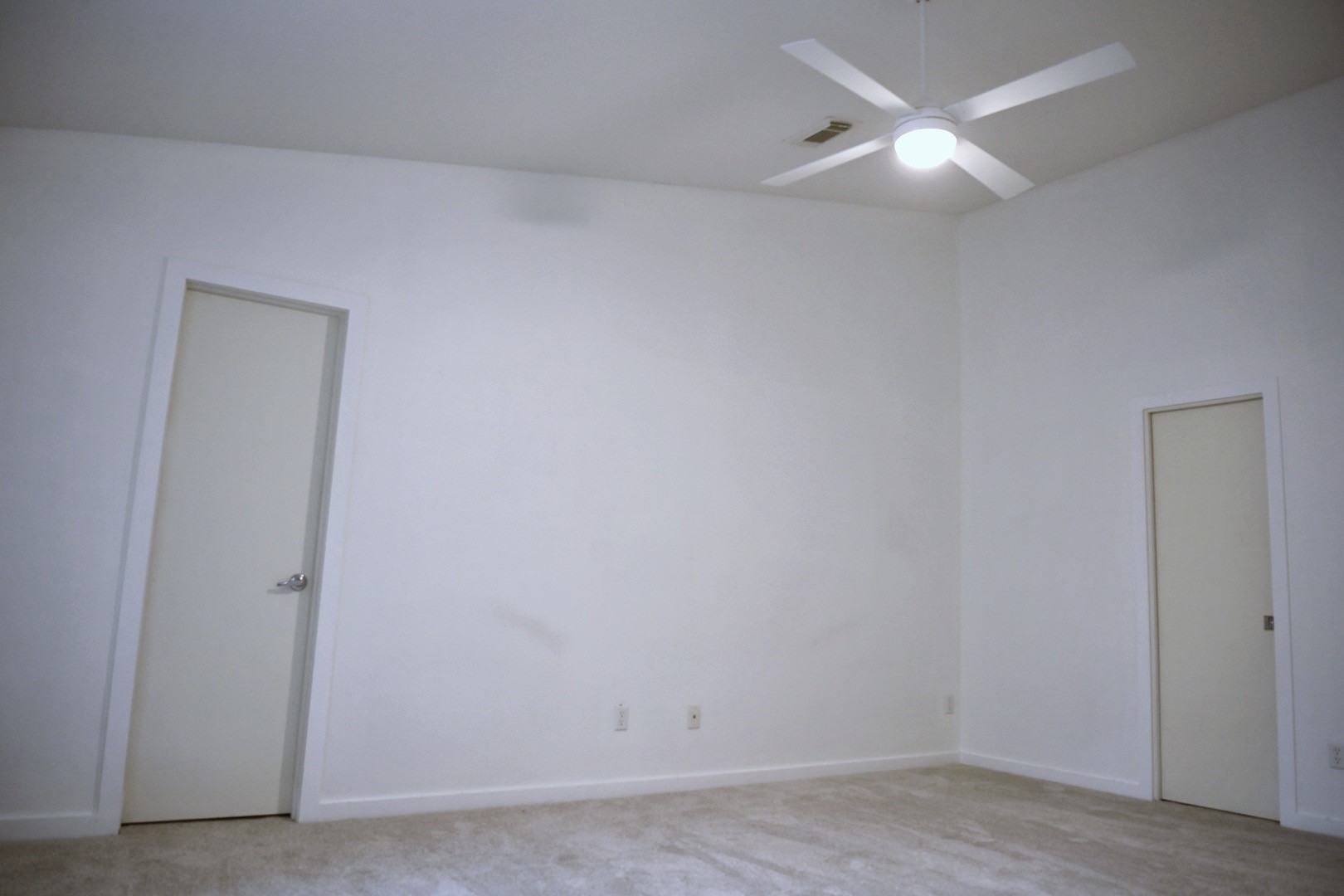 702 Ruthven Street Houston, TX 77019 - Photo 16 of 18 an empty room with wooden floor and fan