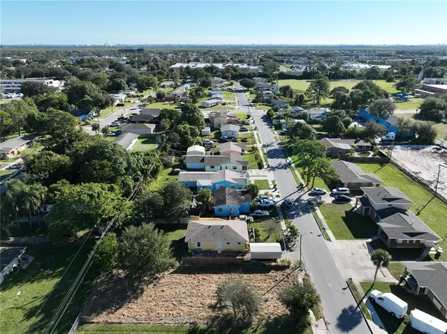 an aerial view of a city with lots of residential buildings