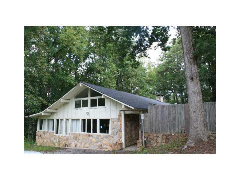 Exterior Front. Stone & Frame