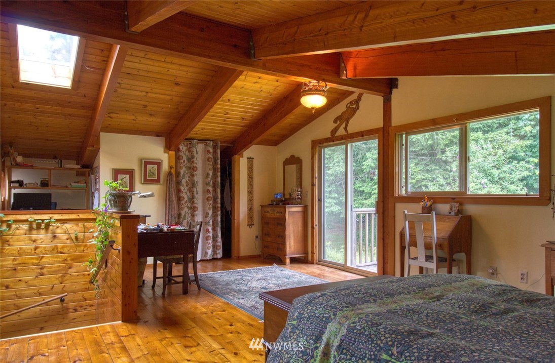 2707 Dabob Road Quilcene, WA 98376 - Photo 14 of 36 a bedroom with a bed and a desk