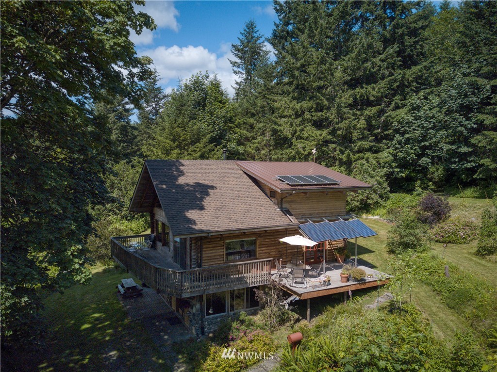 2707 Dabob Road Quilcene, WA 98376 - Photo 27 of 36 an aerial view of a house with yard table and chairs