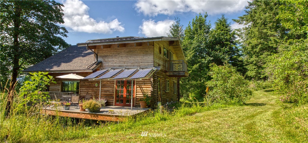 2707 Dabob Road Quilcene, WA 98376 - Photo 30 of 36 aerial view of a house with garden