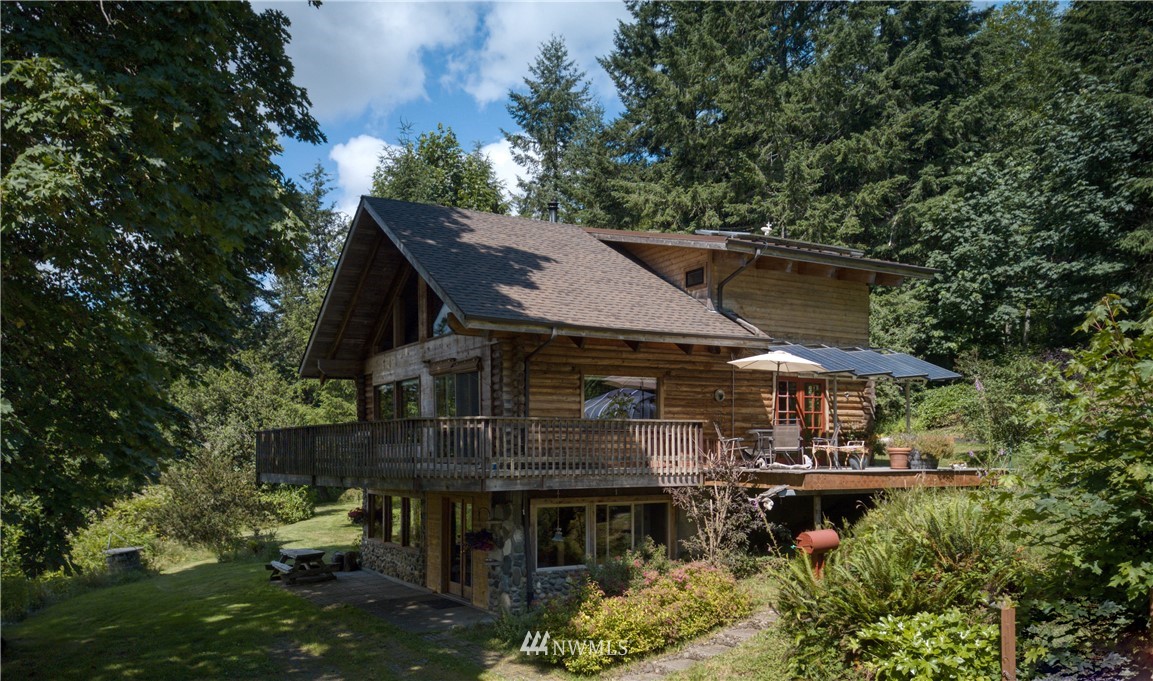2707 Dabob Road Quilcene, WA 98376 - Photo 34 of 36 an aerial view of a house with yard table and chairs