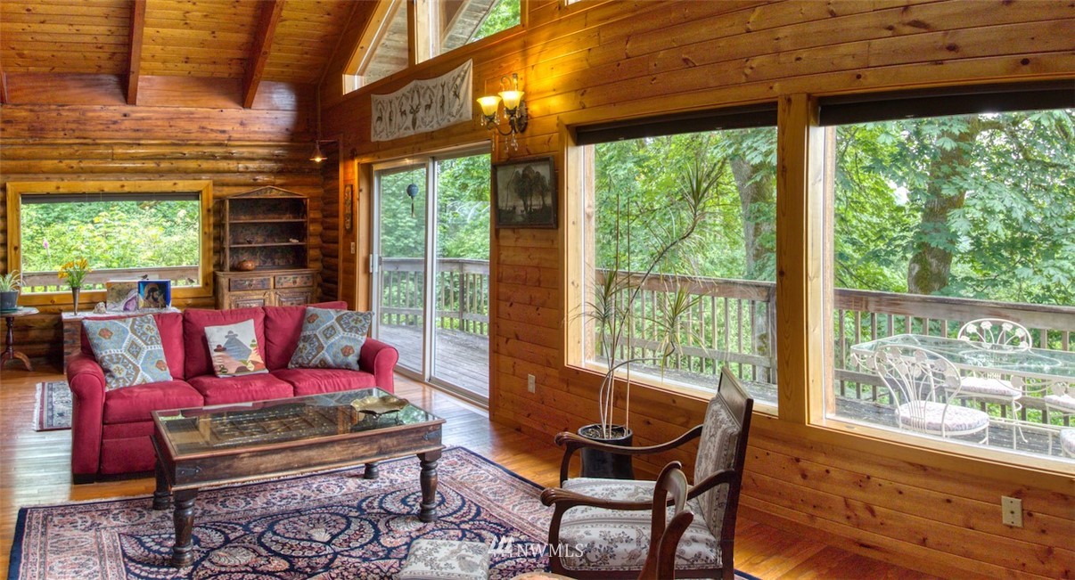 2707 Dabob Road Quilcene, WA 98376 - Photo 7 of 36 a living room with furniture and a window