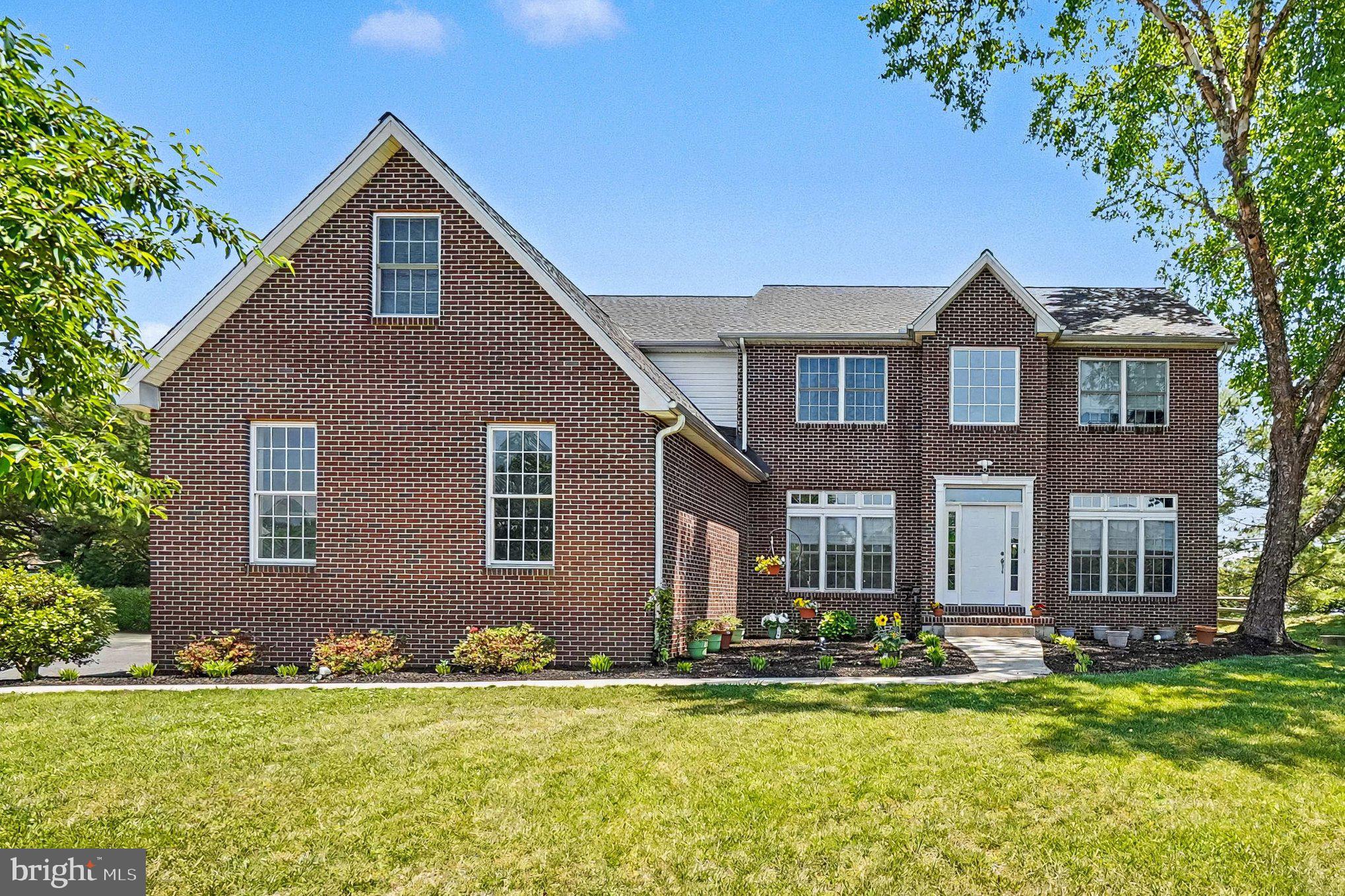 64 Open Meadow Court Elkton, MD 21921 - Photo 1 of 57 a front view of a house with a yard