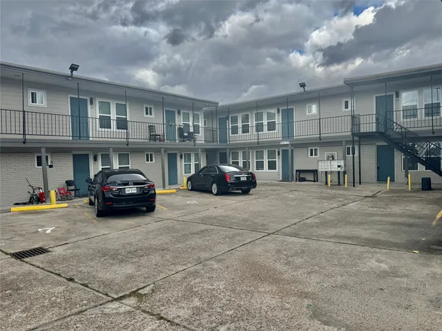 a car parked in front of a building
