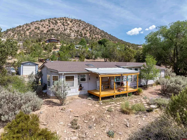 a view of a house with a big yard
