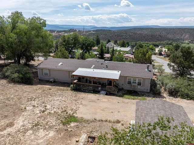 a view of balcony with furniture