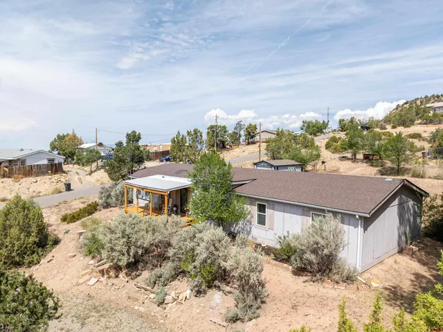 a view of a town with trees around