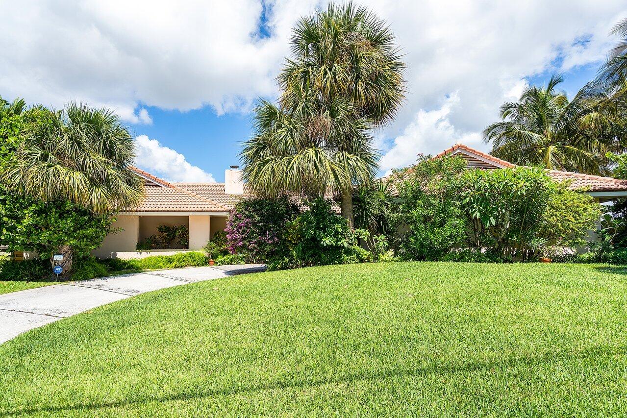 7 Sabal Island Drive Ocean Ridge, FL 33435 - Photo 14 of 44 a view of a house with a yard