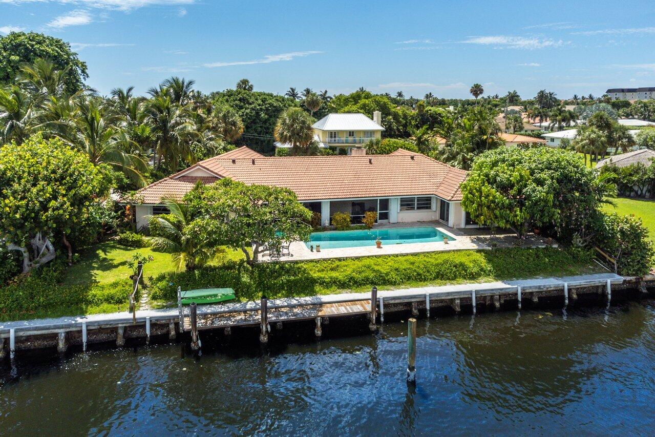 7 Sabal Island Drive Ocean Ridge, FL 33435 - Photo 24 of 44 a view of a lake with houses