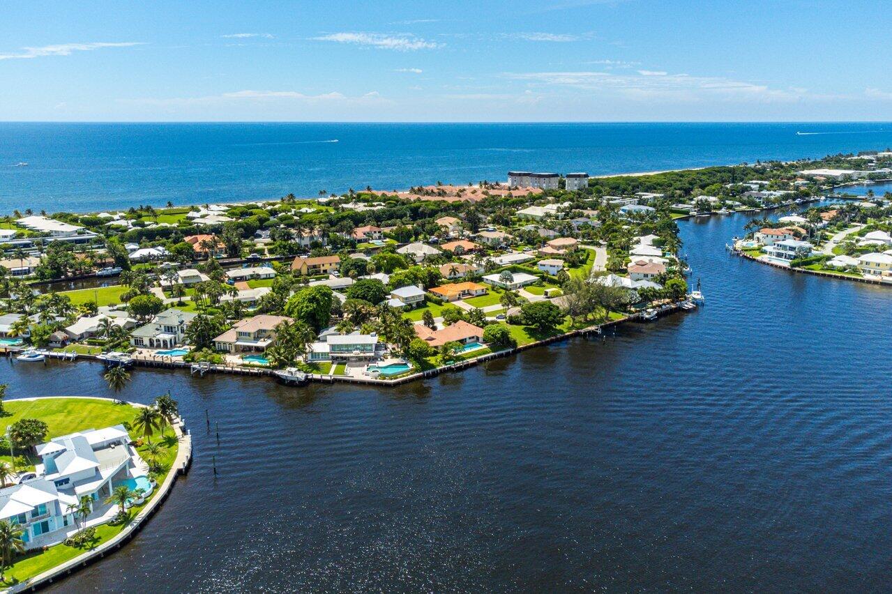 7 Sabal Island Drive Ocean Ridge, FL 33435 - Photo 30 of 44 an aerial view of a houses with a lake view