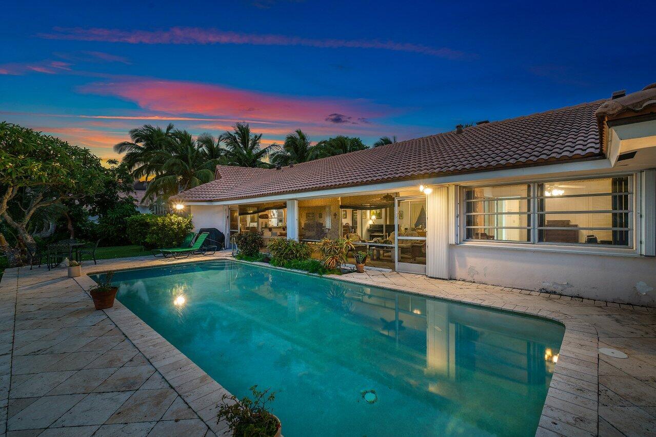 7 Sabal Island Drive Ocean Ridge, FL 33435 - Photo 37 of 44 a view of an house with backyard space and balcony
