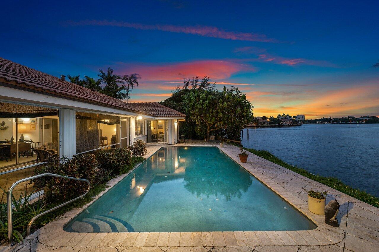 7 Sabal Island Drive Ocean Ridge, FL 33435 - Photo 40 of 44 a view of swimming pool with outdoor seating