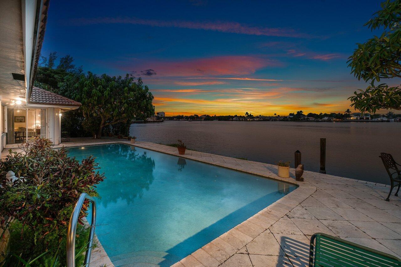 7 Sabal Island Drive Ocean Ridge, FL 33435 - Photo 41 of 44 a view of a lake from a yard